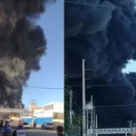 Reportan un fuerte incendio en el deposito de gomas de la Alcaldía de Santo Domingo Este, ubicado en el sector El Almirante,