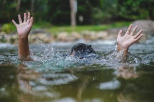Person,Drowns,In,The,River,Reaching,For,Help.,Hand,Drowning